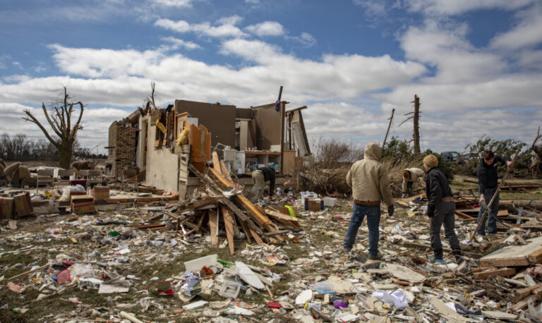 At least 26 dead after tornadoes rake US Midwest, South